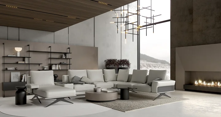 Nowoczesny salon z beżową narożną sofą, stolikiem, żyrandolem, dużym oknem z zaśnieżonym widokiem i kominkiem.